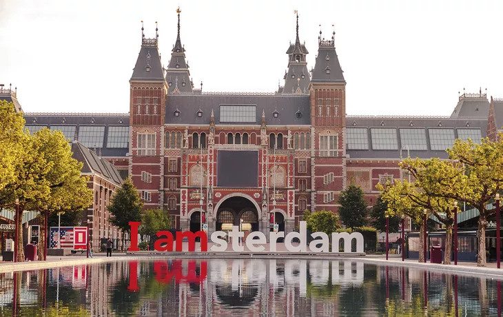 The sign i amsterdam in front of rijksmuseum in Amsterdam on sun